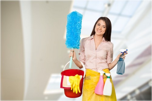 Person preparing supplies for safe oven cleaning