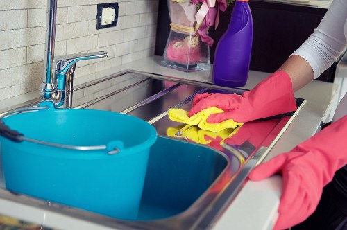 Eco-friendly house cleaning supplies on a clean table