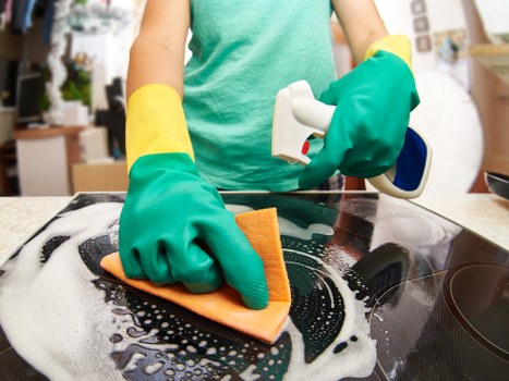 Kitchen move in cleaning with attention to appliances and counters