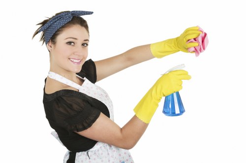 Technician removing stains during carpet cleaning